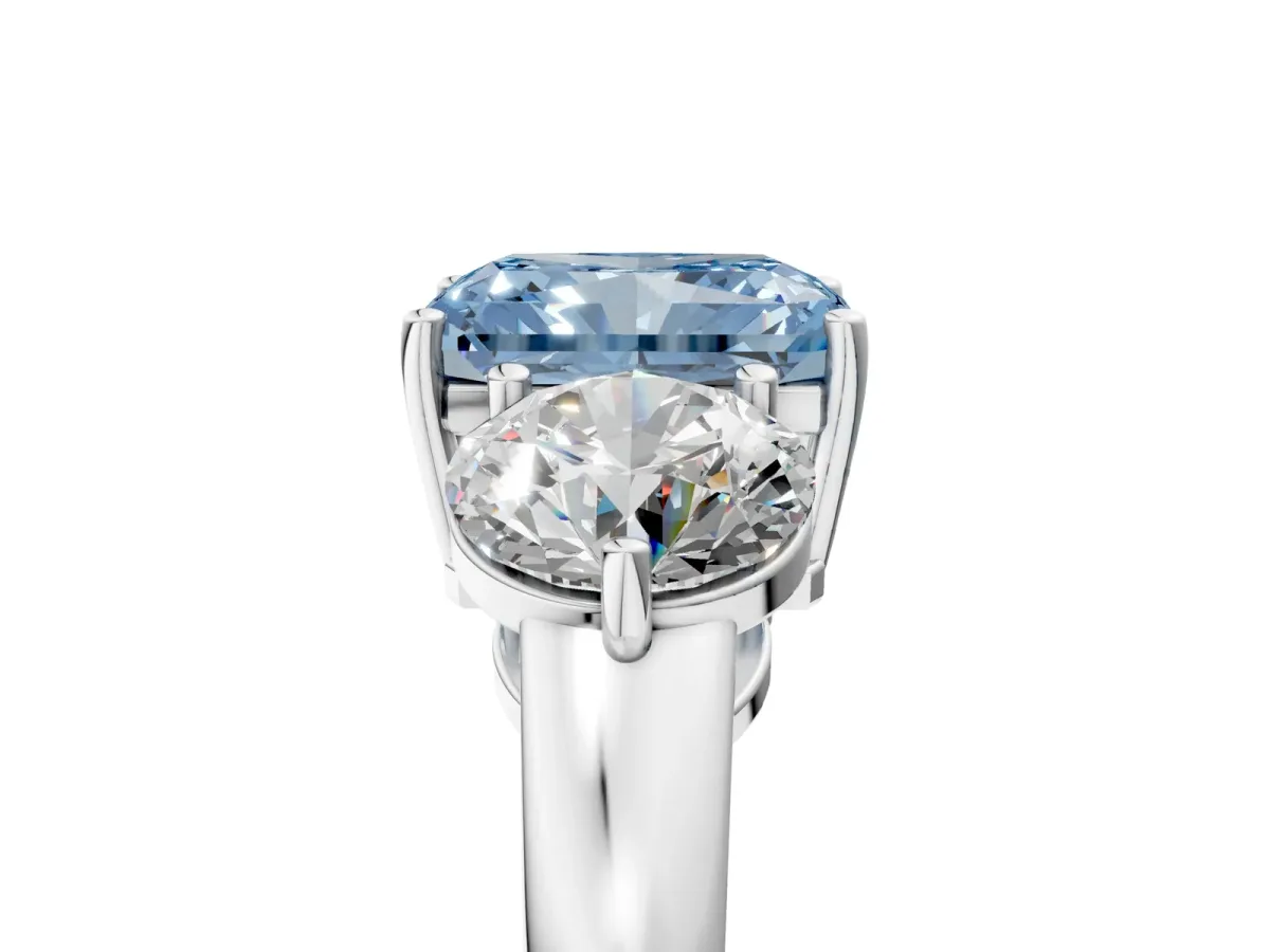 Fancy Blue Radiant Cut Diamond Three-Stone Ring with Prong Setting and Classic Band Platinum