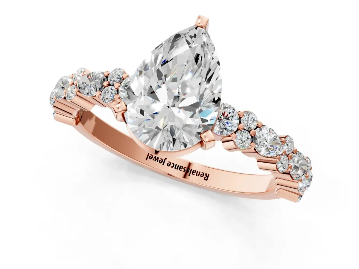 Pear Cut Diamond Side Stone Solitaire Ring with Round and Four-Prong Setting Rose gold