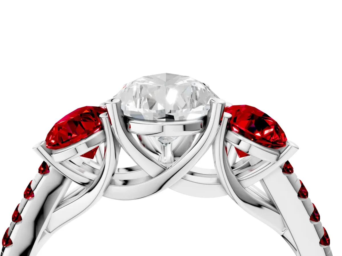 Three-Stone Pear Cut Diamond Ring with Round Ruby Pavé Band and Prong Setting Platinum