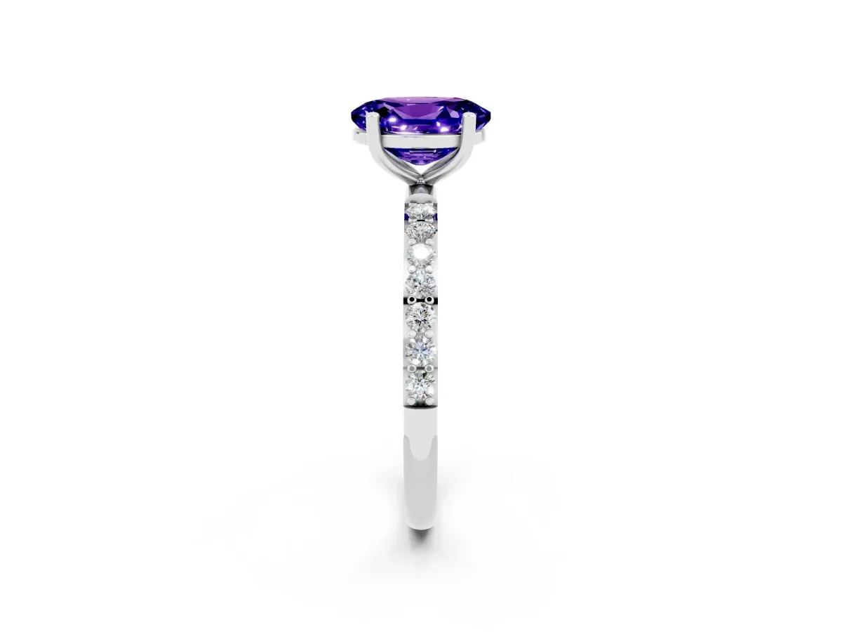 Oval Cut Tanzanite Solitaire Ring with Round Pavé Band and Prong Setting Silver