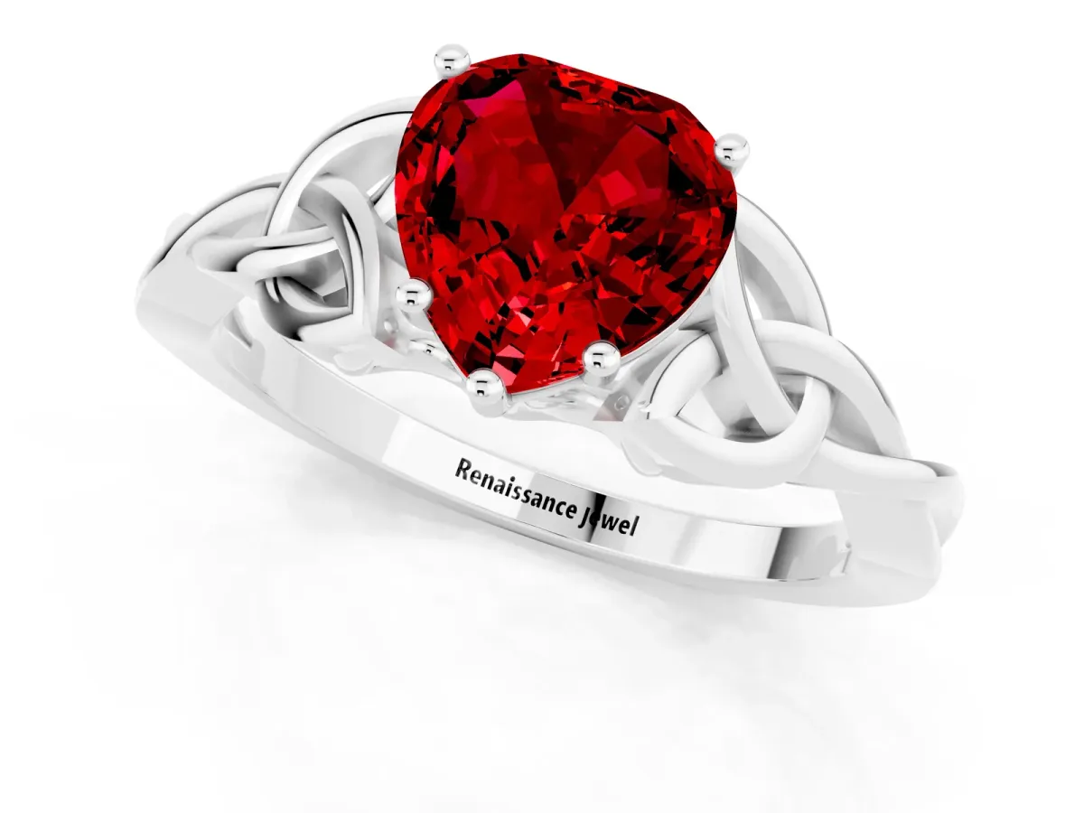 Heart Cut Ruby Solitaire Engagement Ring with Celtic Knot Band and Four-Prong Setting Silver