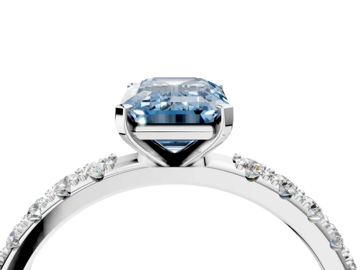 Fancy Blue Emerald Cut Diamond Solitaire Pavé Band with Four-Prong Setting Silver