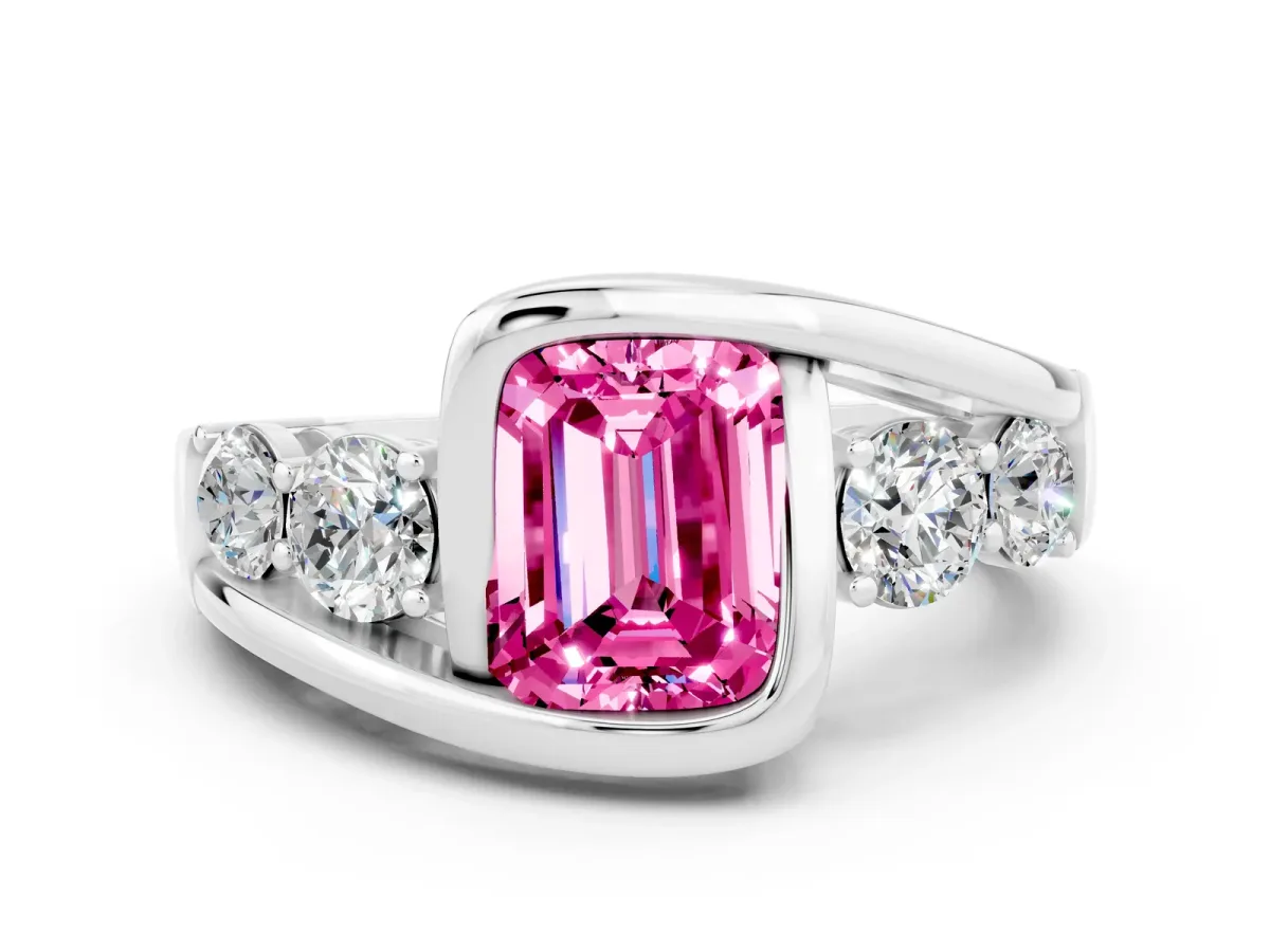 Bezel Set Emerald Cut Pink Sapphire Bypass Ring with Round Accents Platinum
