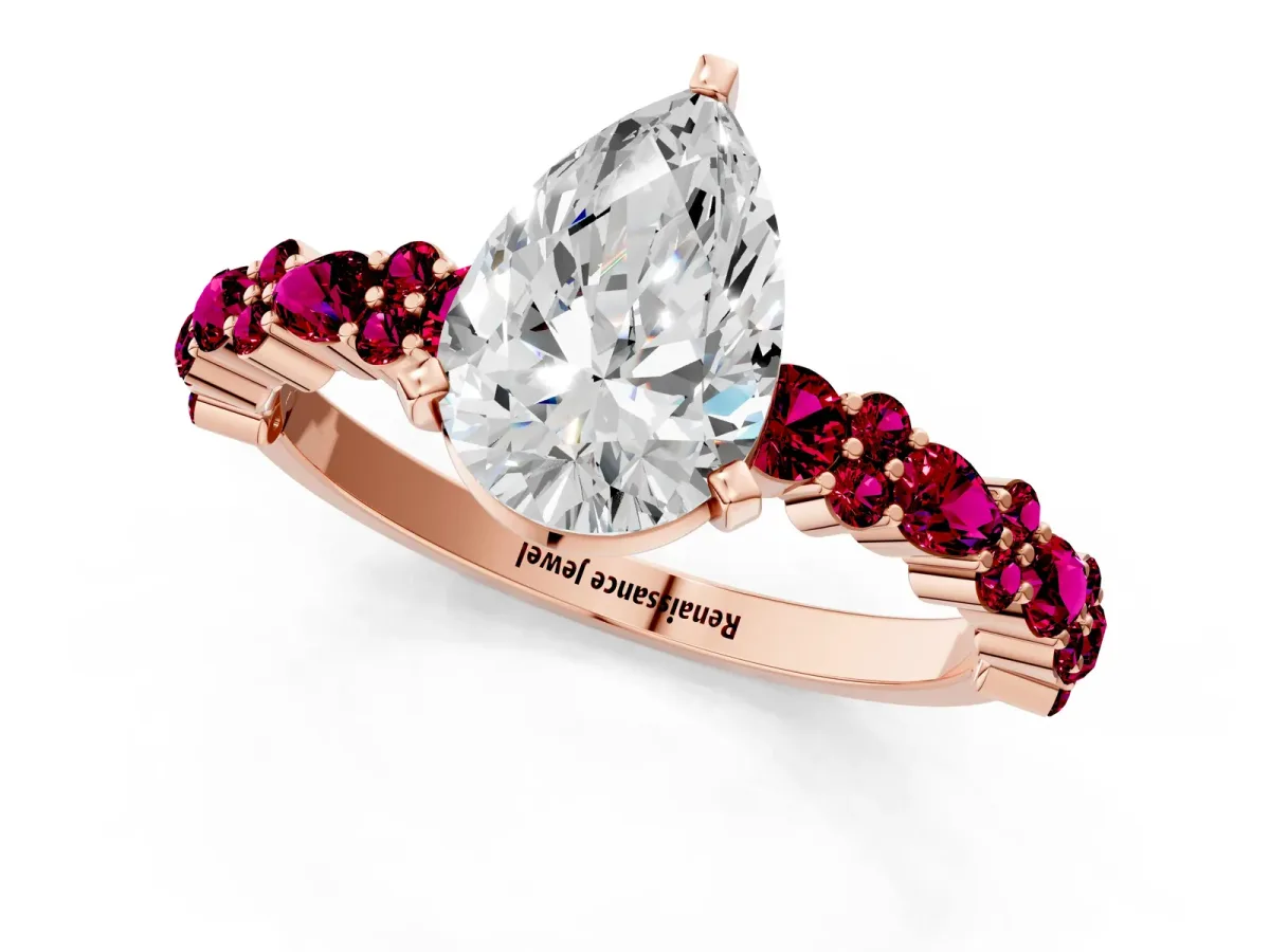 Pear Cut Diamond Side Stone Solitaire Ring with Round Garnet and Four-Prong Setting Rose gold