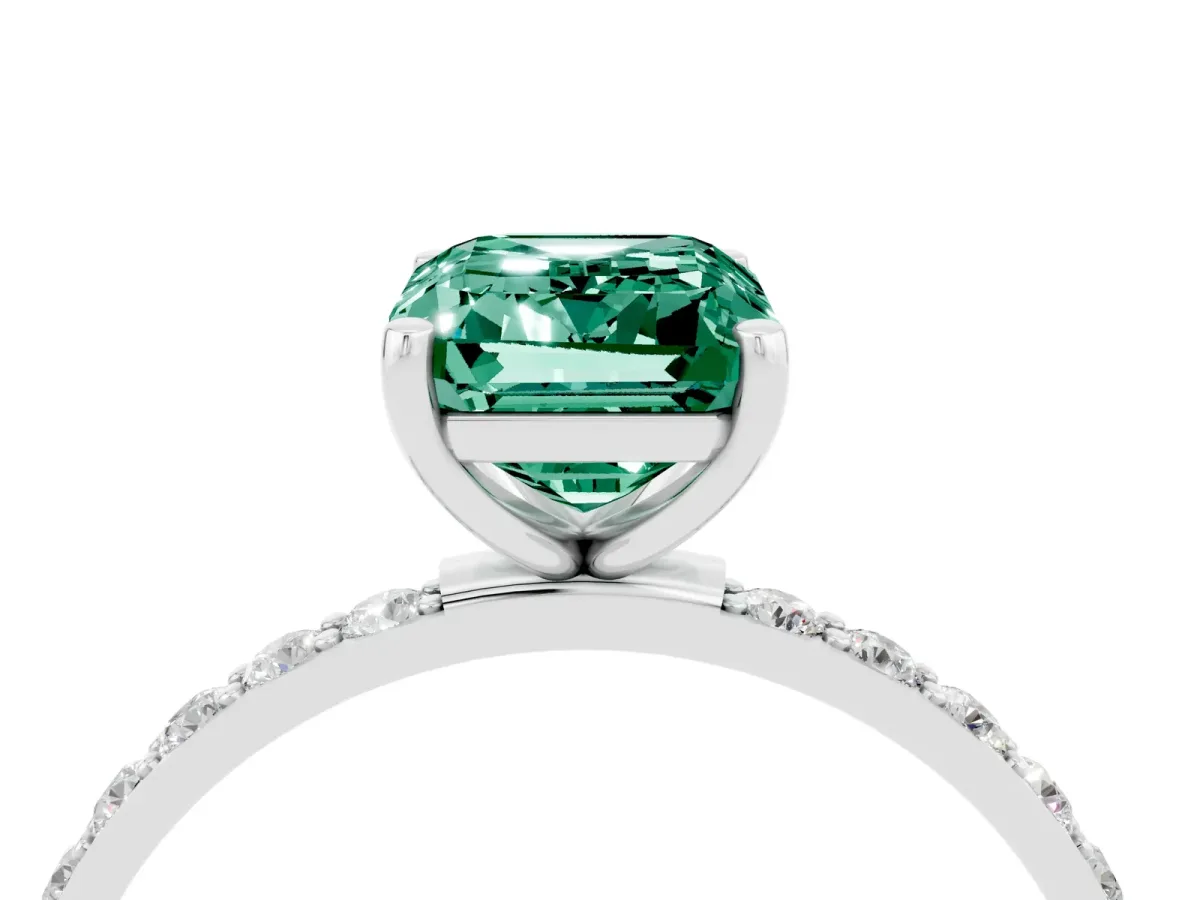 Emerald Cut Green Sapphire Solitaire Ring with Round Pavé Shoulders and Prong Setting Silver