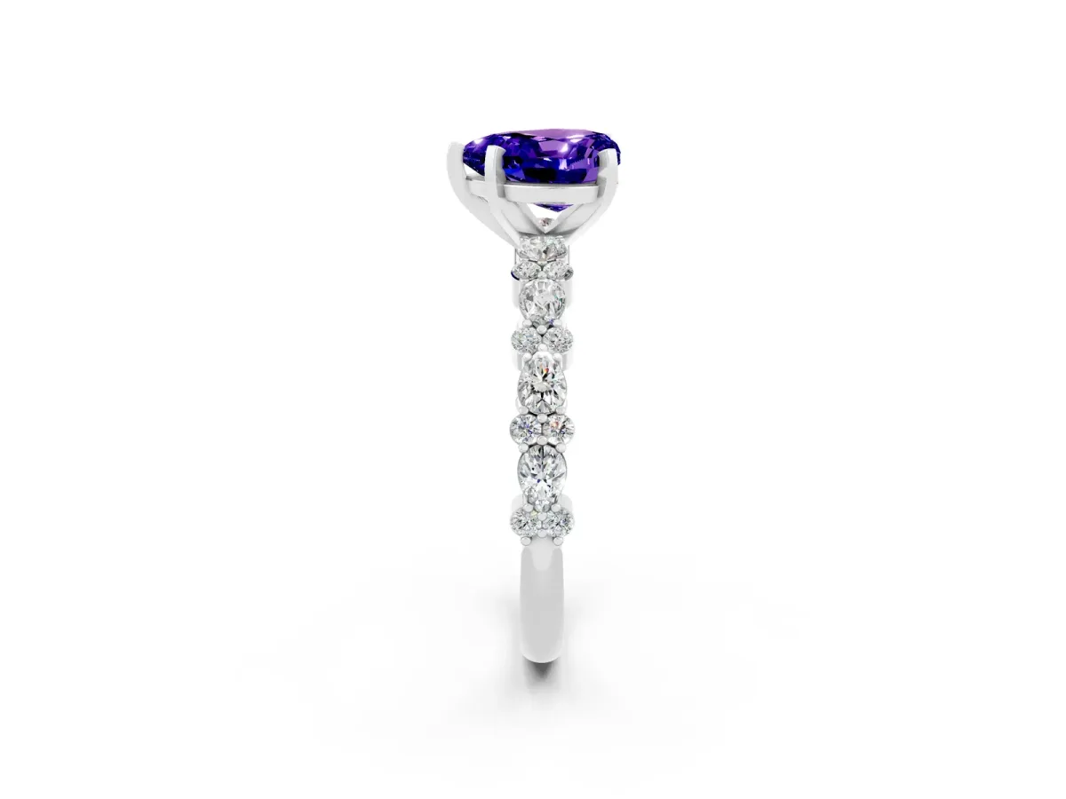 Heart Cut Tanzanite Side Stone Solitaire Ring with Round and Four-Prong Setting Platinum