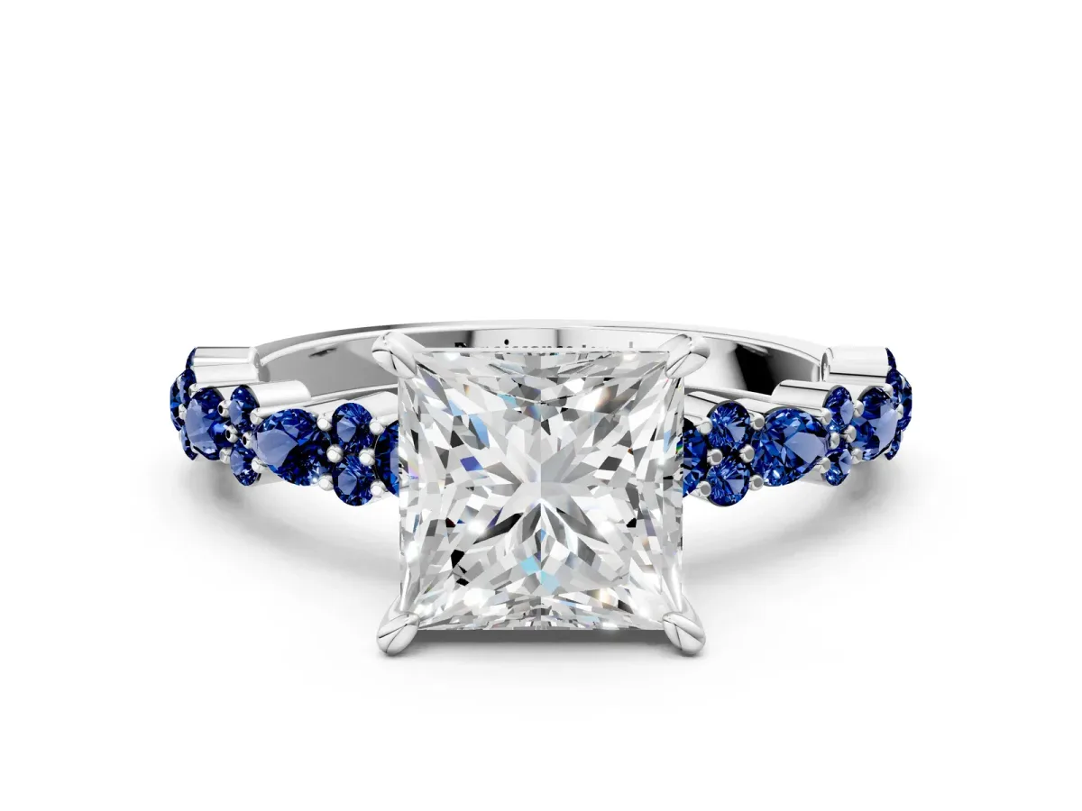 Princess Cut Diamond Side Stone Solitaire Ring with Round Blue Sapphire and Four-Prong Setting Silver