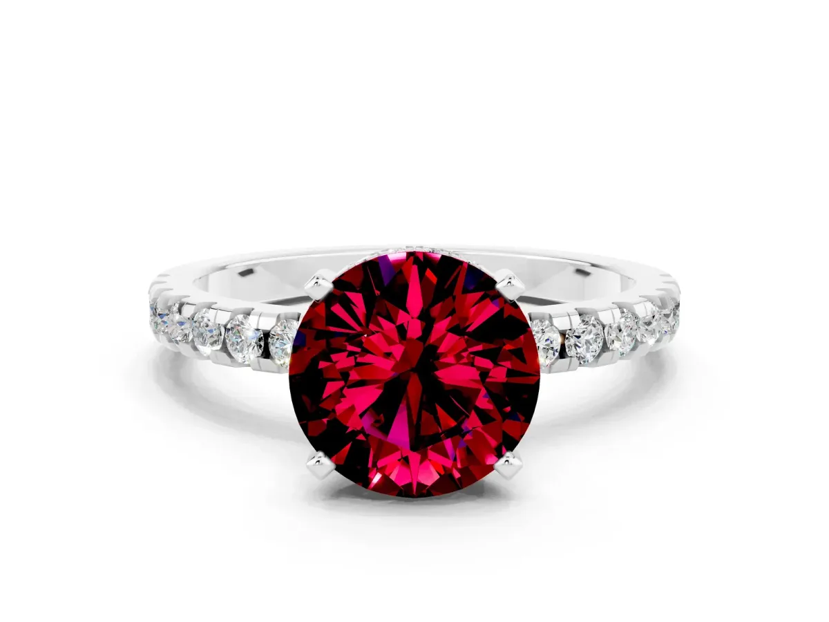 Round Cut Garnet Solitaire Ring with Round Pavé Band and Four-Prong Setting Silver