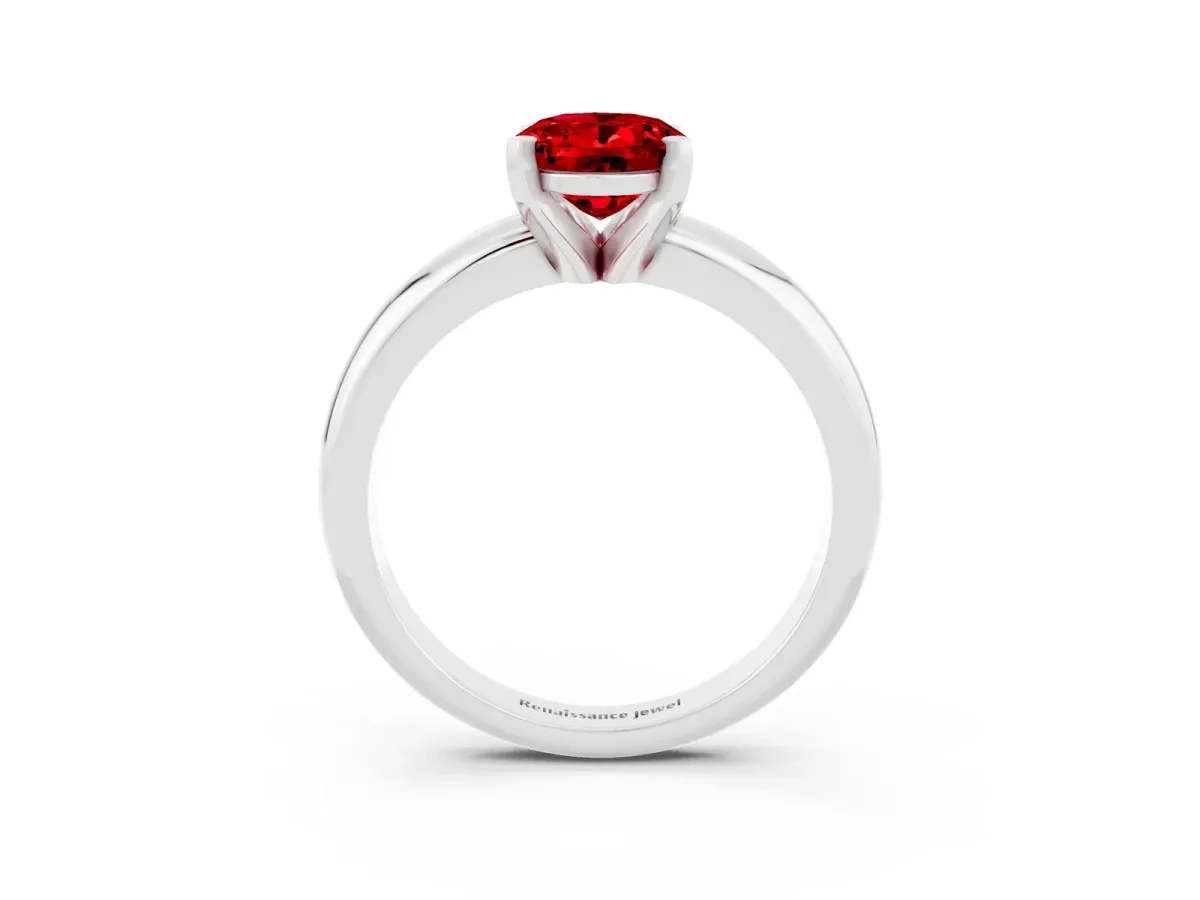 Oval Cut Ruby Solitaire Engagement Ring with Round Band and Four-Prong Setting Silver