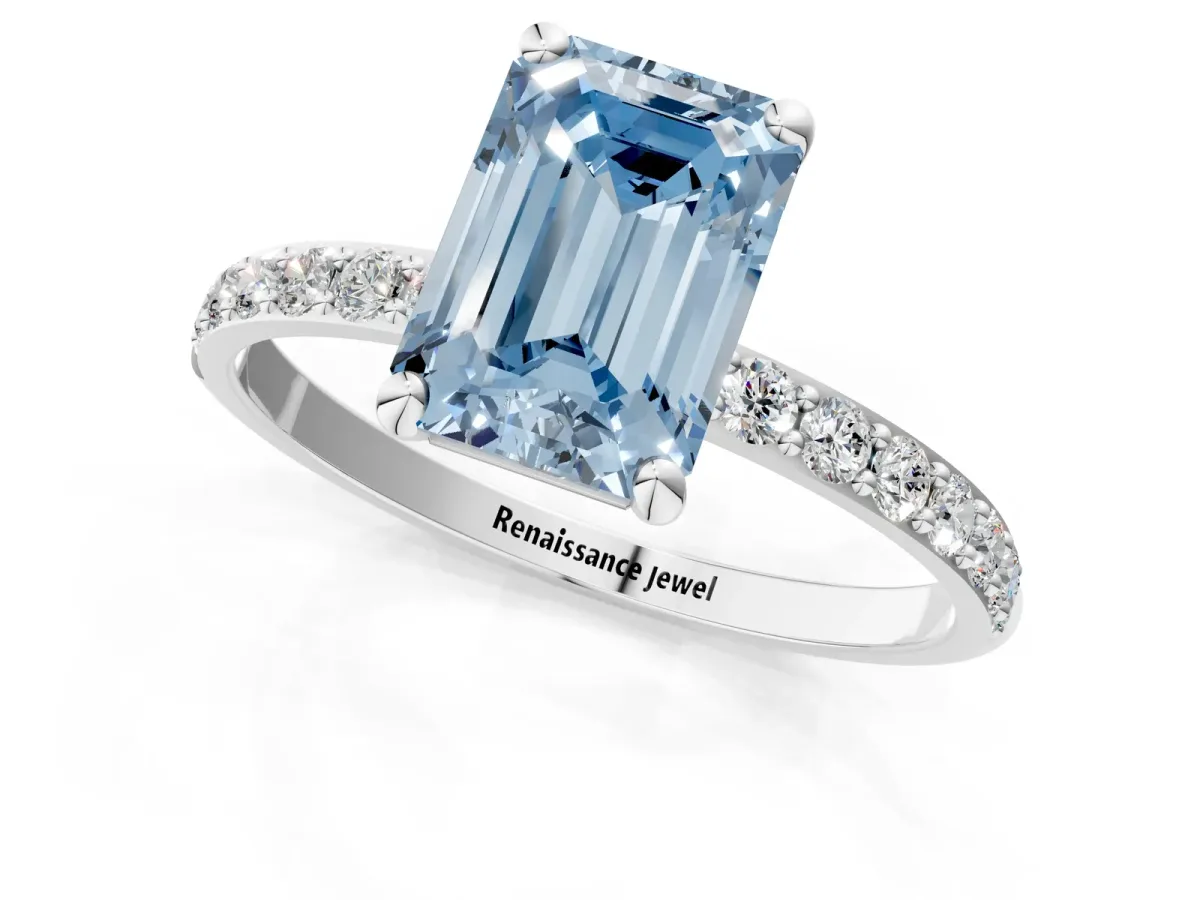 Fancy Blue Emerald Cut Diamond Solitaire Ring with Round Pavé Band and Prong Setting Silver