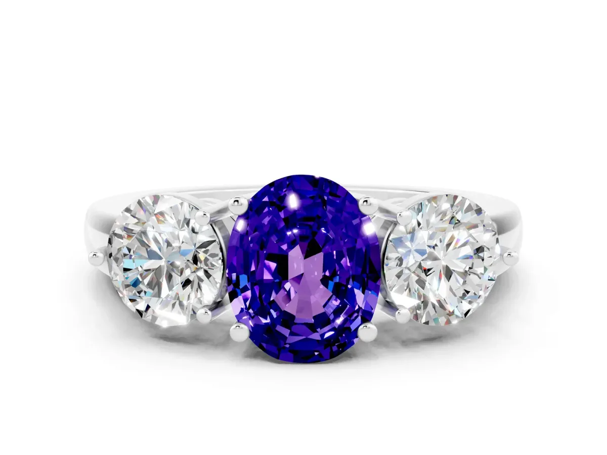 Oval Cut Tanzanite Three-Stone Ring with Prong Setting and Classic Band White gold