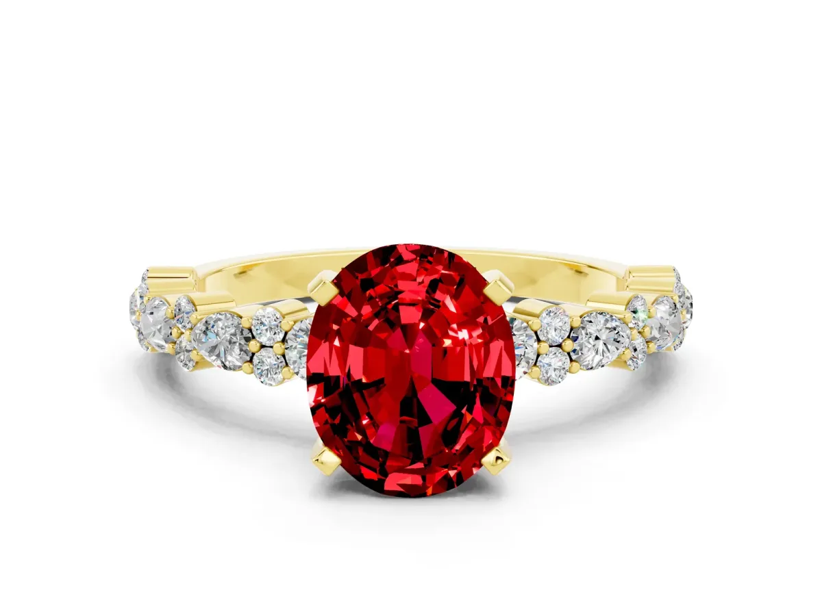 Oval Cut Ruby Side Stone Solitaire Ring with Round and Four-Prong Setting Yellow gold