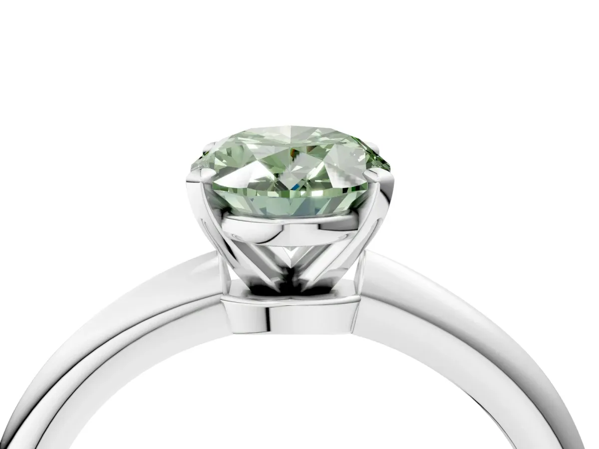 Fancy Green Oval Cut Diamond Solitaire Ring with Six-Prong Setting and Classic Band Silver