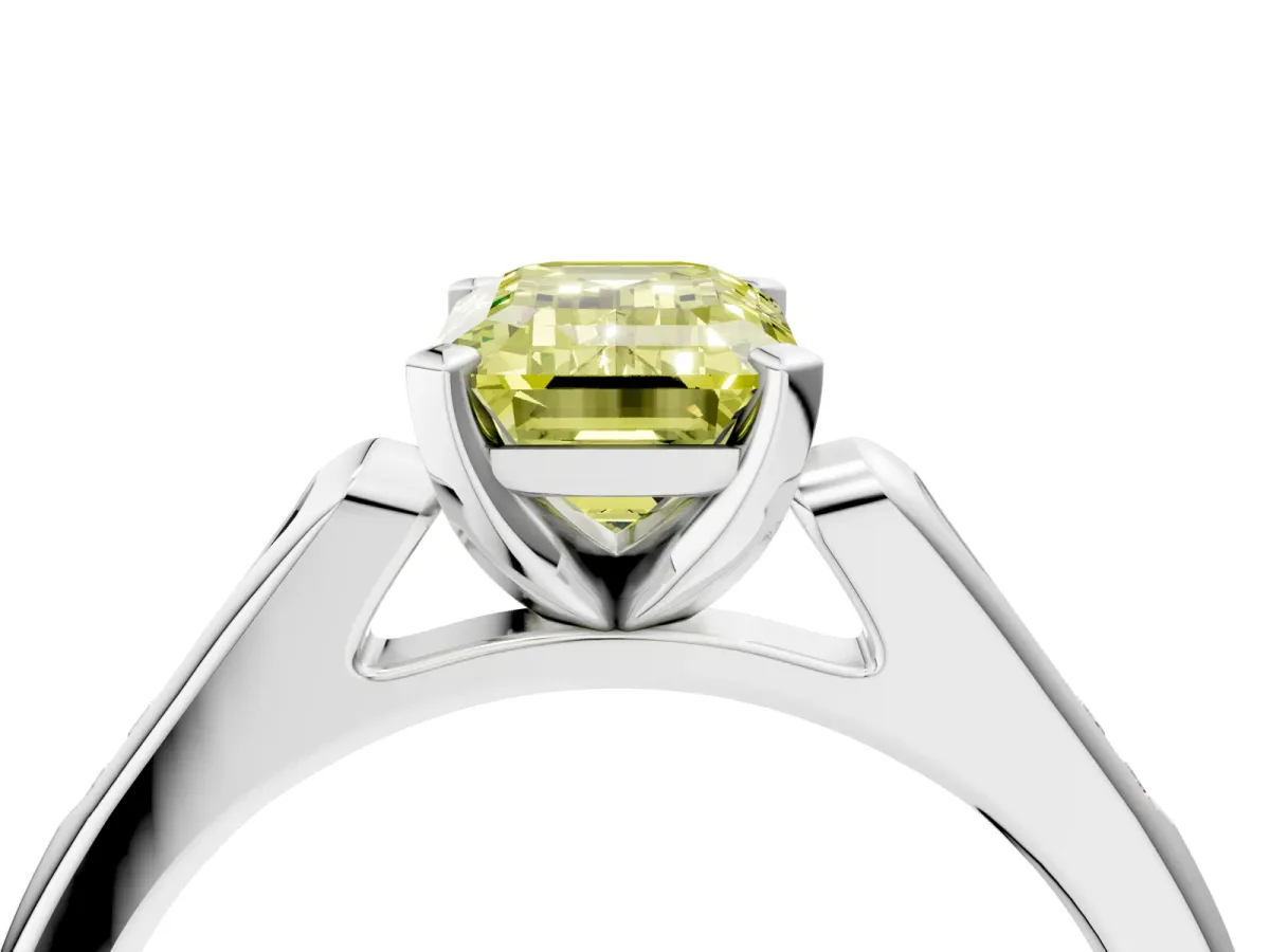 Fancy Yellow Emerald Cut Diamond Solitaire Ring with Channel Set Round Band and Prong Setting Silver