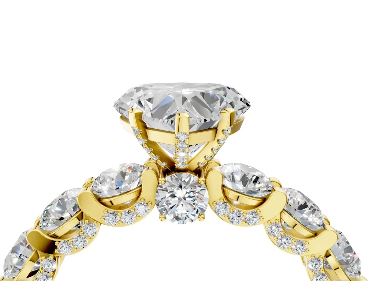Heart Cut Diamond Side Stone Engagement Ring with Four-Prong Setting Yellow gold