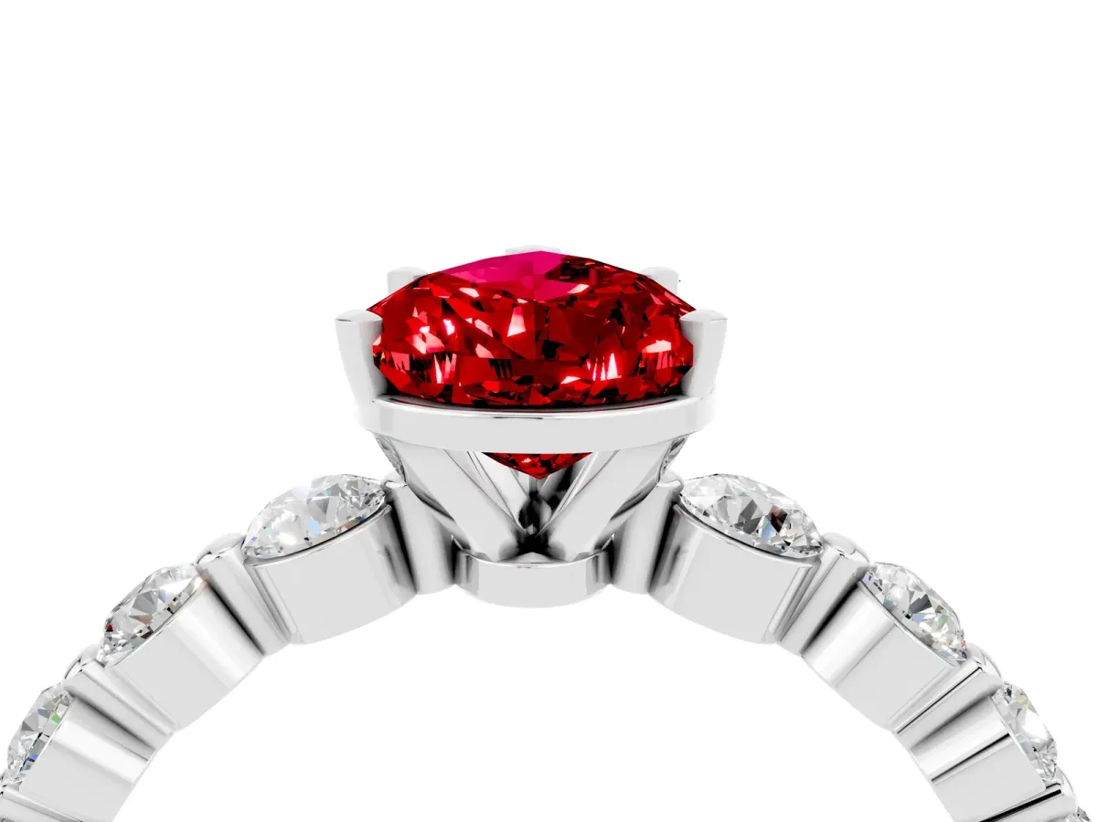 Pear Cut Solitaire Ruby Ring with Pave Band and Four-Prong Setting Platinum