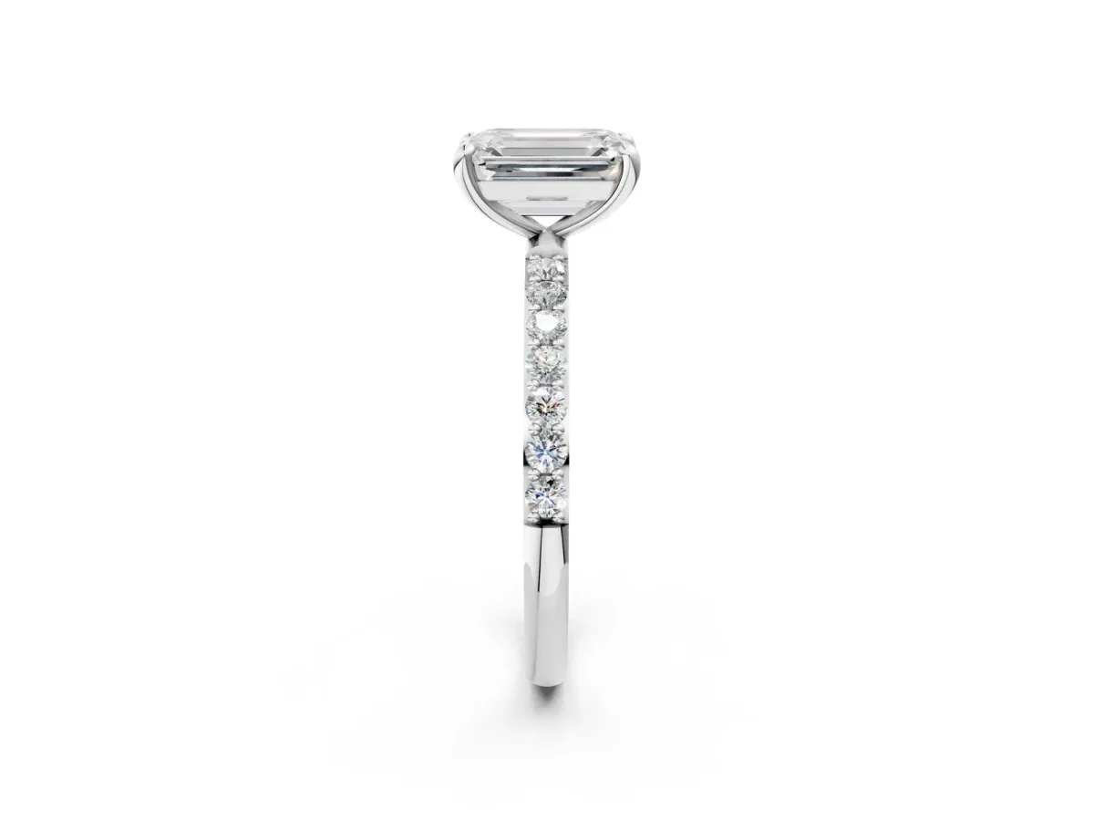 Emerald Cut Diamond Solitaire Ring with Round Pavé Band and Prong Setting Platinum
