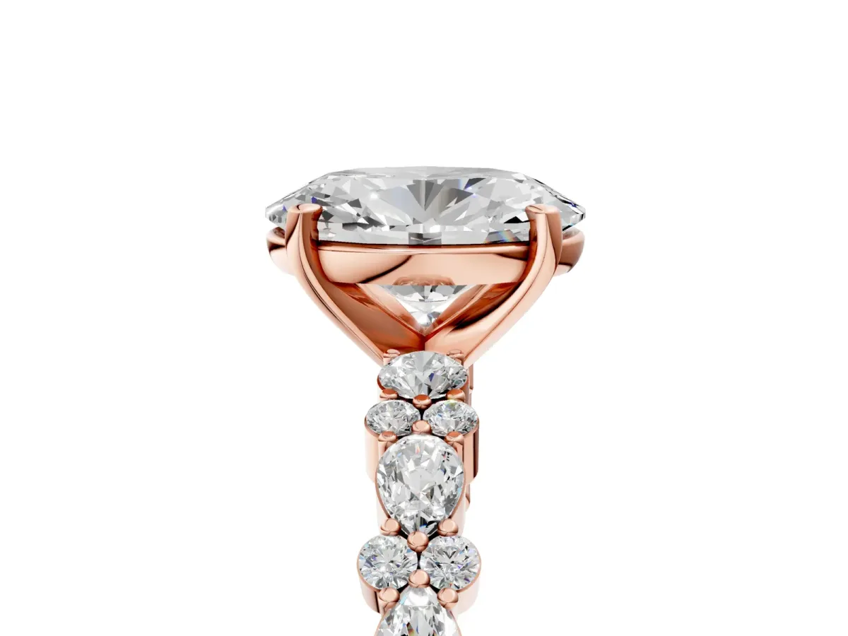 Oval Cut Diamond Side Stone Solitaire Ring with Round and Four-Prong Setting Rose gold