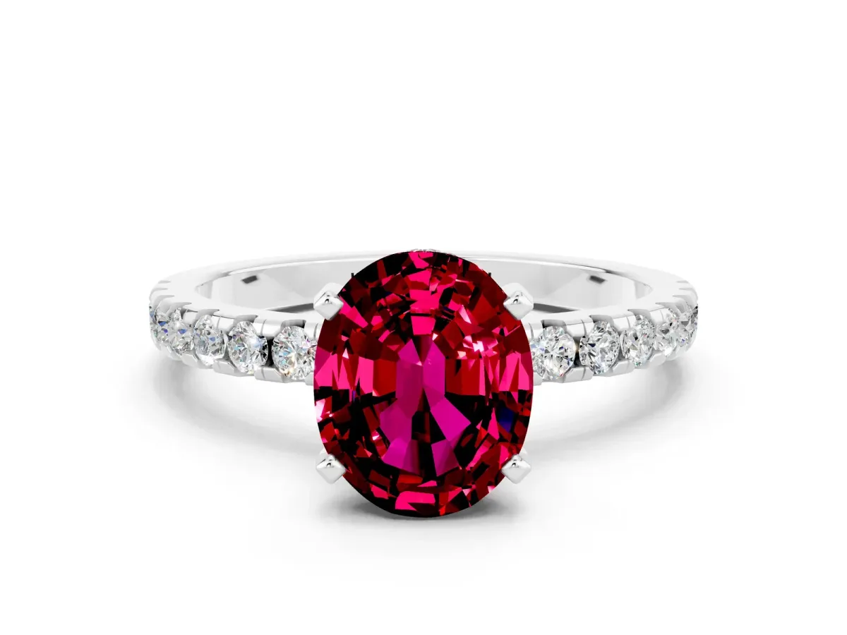 Oval Cut Garnet Solitaire Ring with Round Pavé Band and Four-Prong Setting Silver