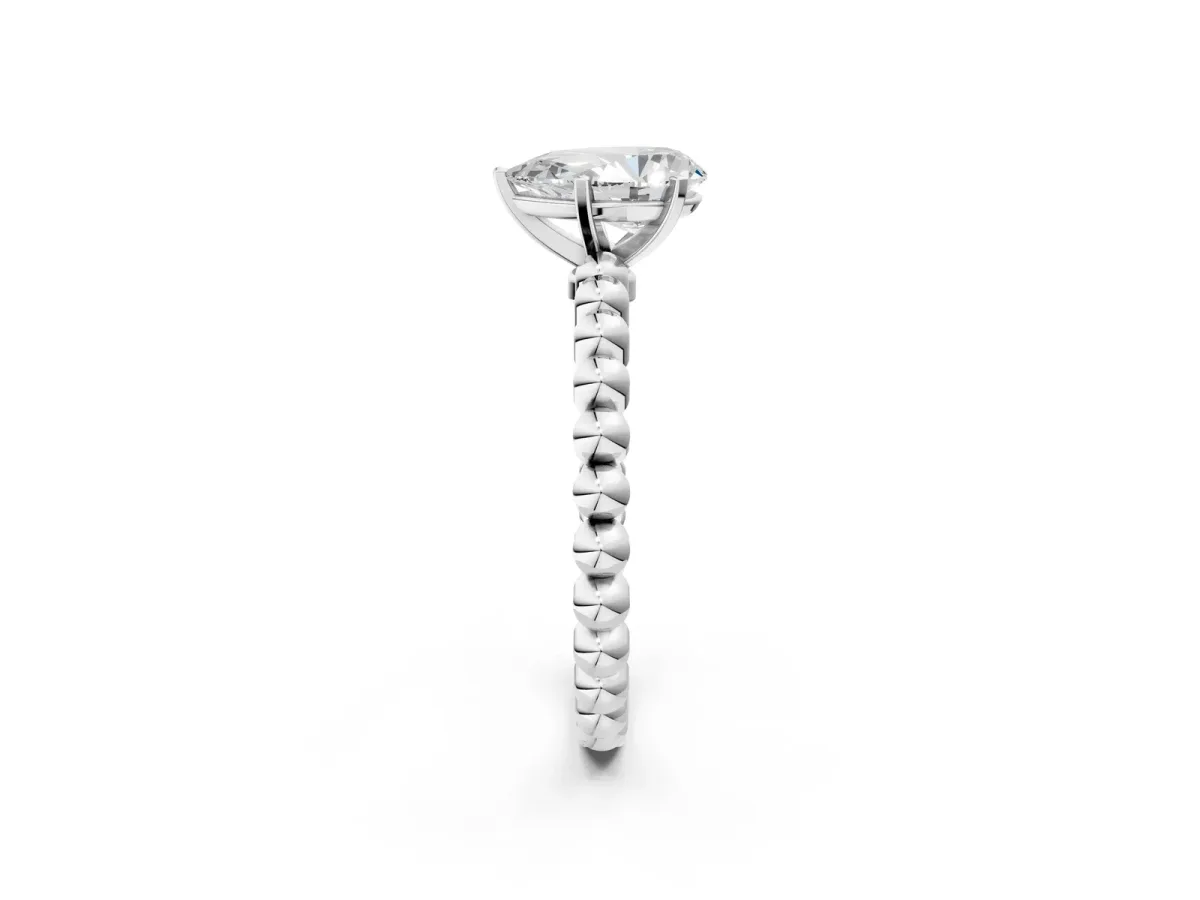Pear Cut Diamond Solitaire Ring with Beaded Band and Prong Setting White gold
