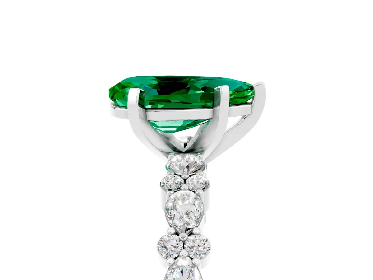 Pear Cut Emerald Side Stone Solitaire Ring with Round and Four-Prong Setting White gold