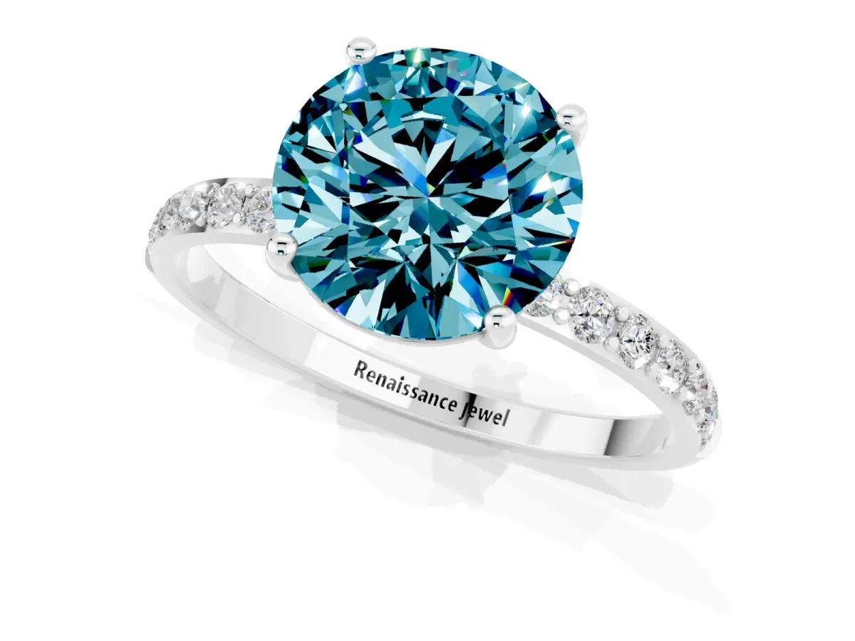Round Cut Blue Topaz Solitaire Ring with Round Pavé Band and Prong Setting Silver