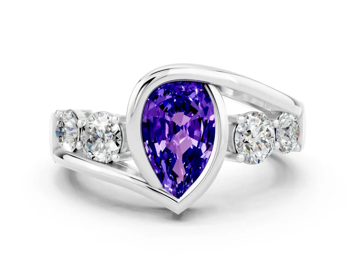 Bezel Set Pear Cut Tanzanite Bypass Ring with Round Accents Silver