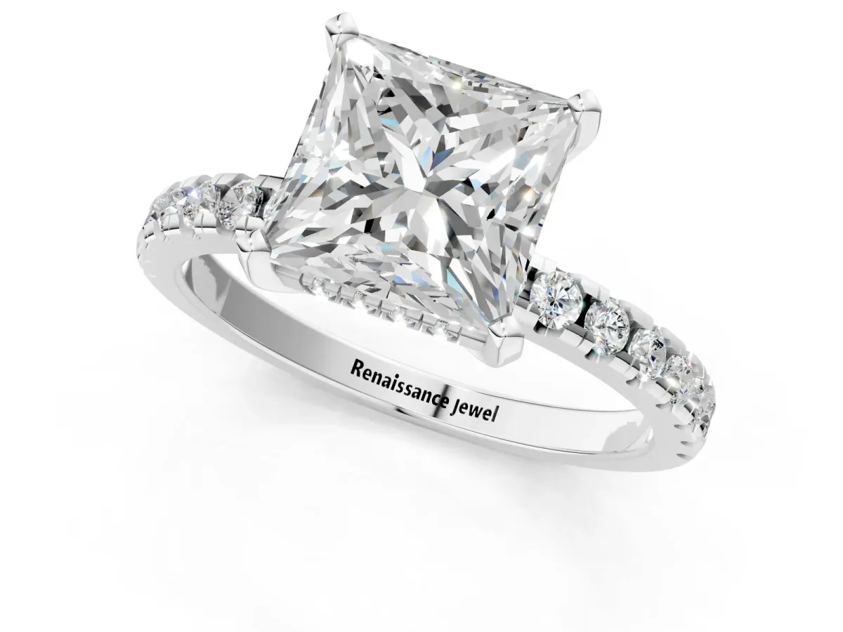 Princess Cut Diamond Solitaire Ring with Round Pavé Band and Four-Prong Setting Silver