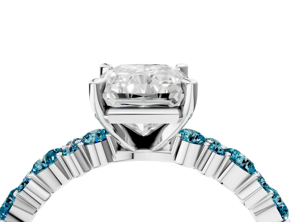 Radiant Cut Diamond Side Stone Solitaire Ring with Round Blue Topaz and Four-Prong Setting Silver