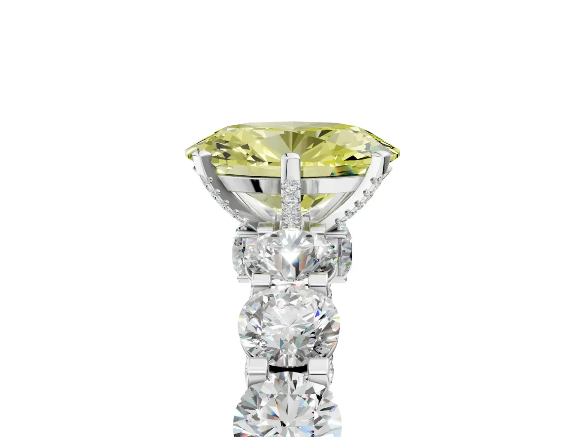 Fancy Yellow Oval Cut Diamond Side Stone Engagement Ring with Four-Prong Setting White gold