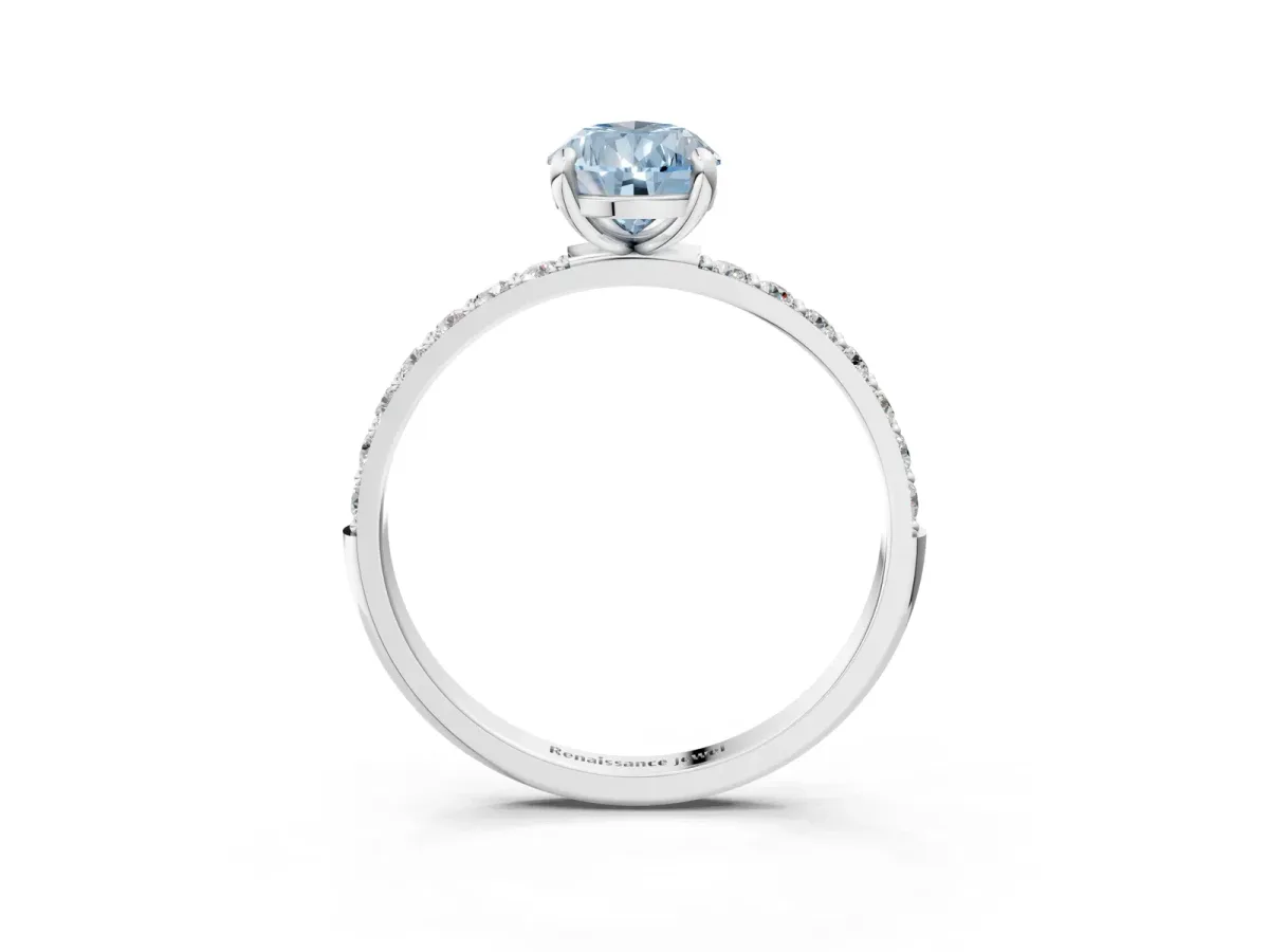 Fancy Blue Pear Cut Diamond Solitaire Ring with Round Pavé Band and Prong Setting Silver