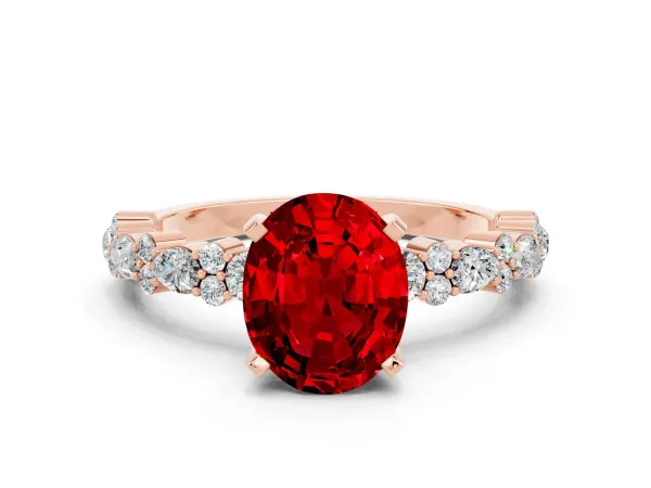 Oval Cut Ruby Side Stone Solitaire Ring with Round and Four-Prong Setting Rose gold