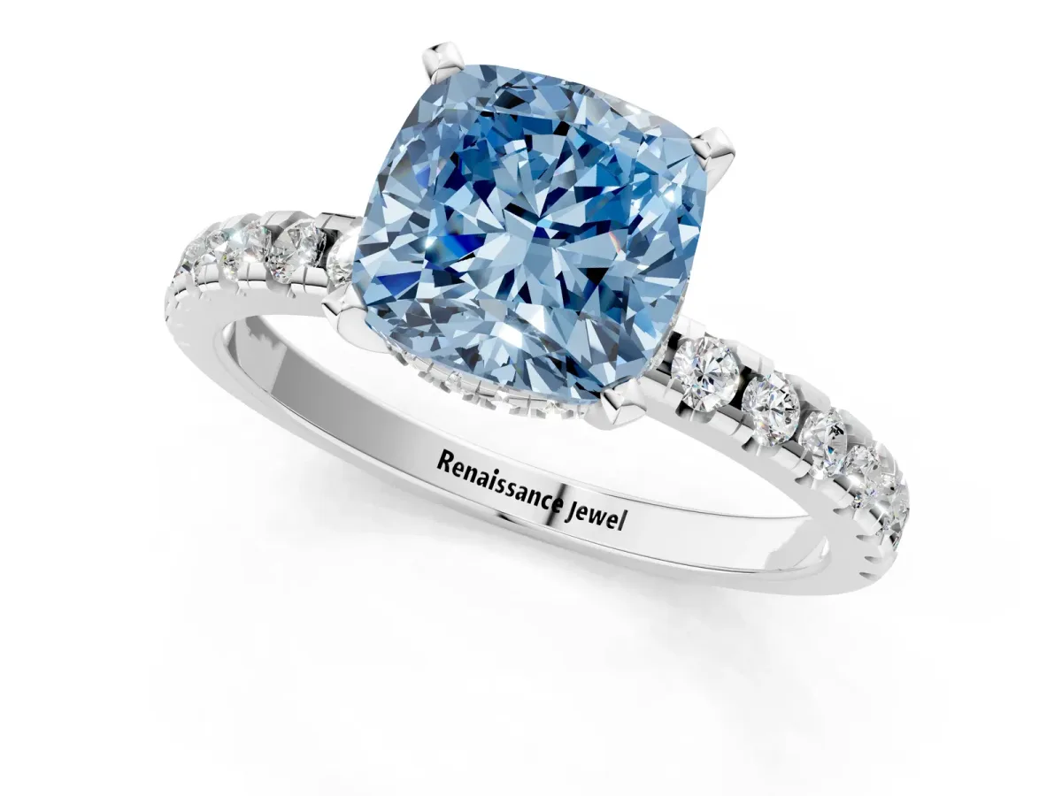 Fancy Blue Cushion Cut Diamond Solitaire Ring with Round Pavé Band and Four-Prong Setting Silver