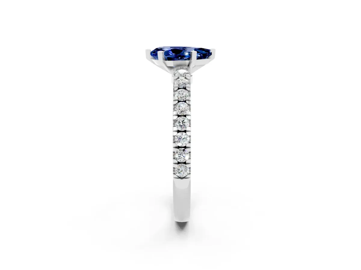 Pear Cut Solitaire Blue Sapphire with Pavé Band and Four-Prong Setting Silver
