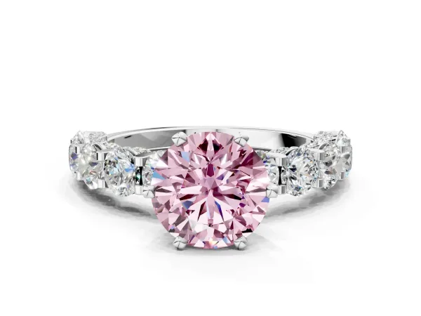 Fancy Pink Round Cut Diamond Side Stone Engagement Ring with Four-Prong Setting Silver