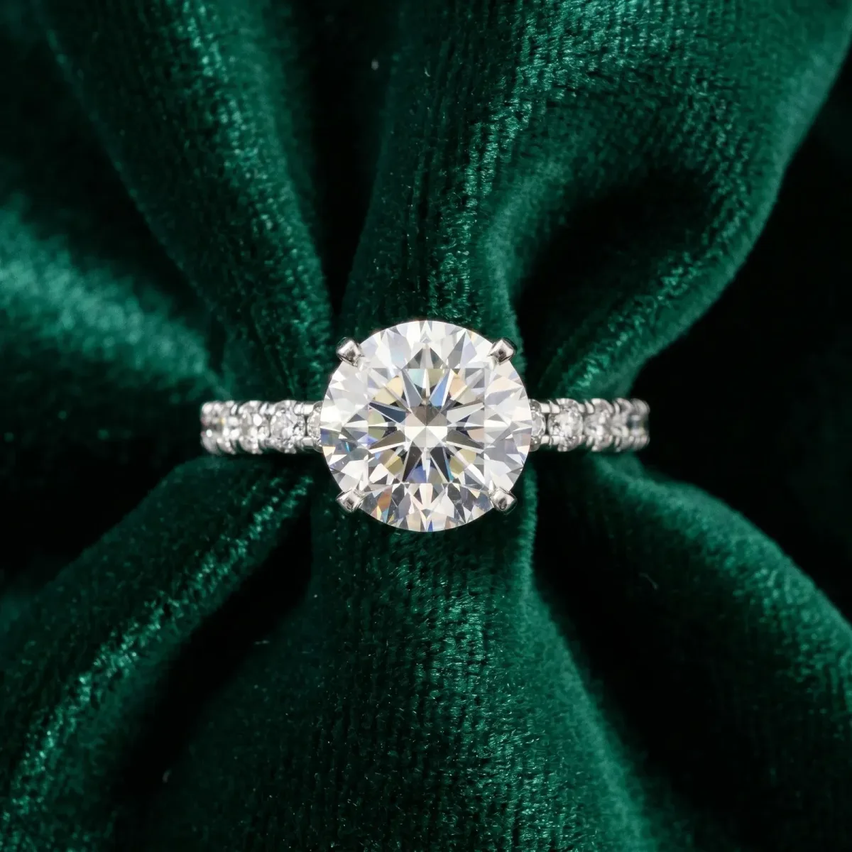 Round Cut Diamond Solitaire Ring with Round Pavé Band and Four-Prong Setting Platinum