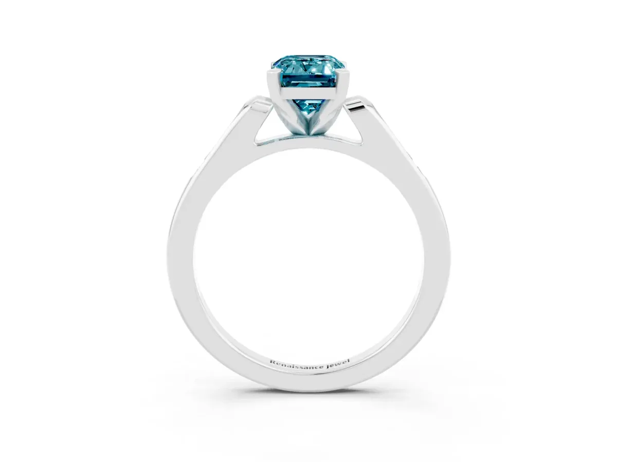 Emerald Cut Blue Topaz Solitaire Ring with Channel Set Round Band and Prong Setting Silver