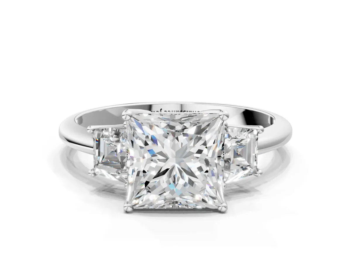 Princess Cut Diamond Three-Stone Ring with Trapezoid Side Stones and Prong Setting Platinum