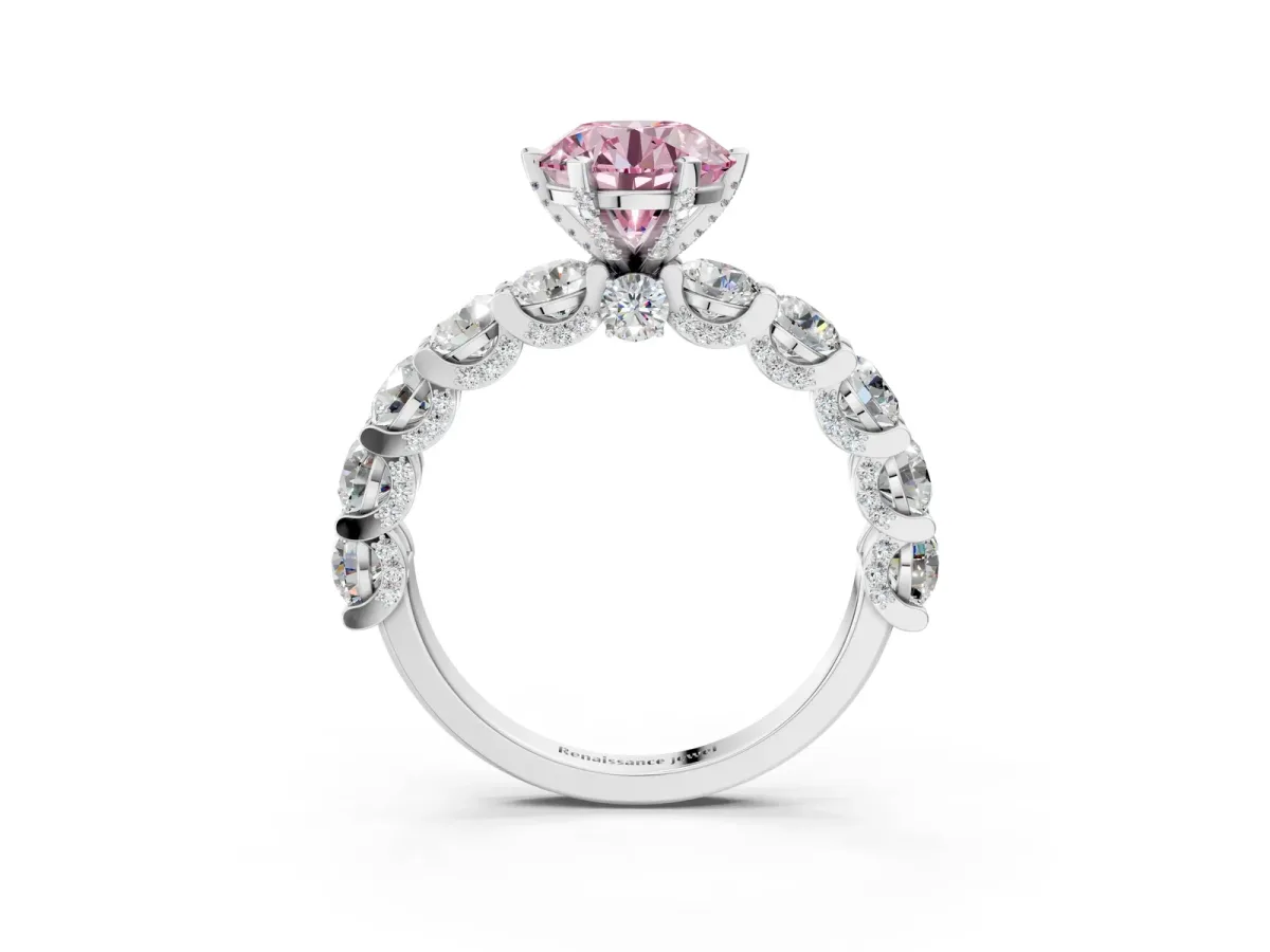 Fancy Pink Round Cut Diamond Side Stone Engagement Ring with Four-Prong Setting Silver