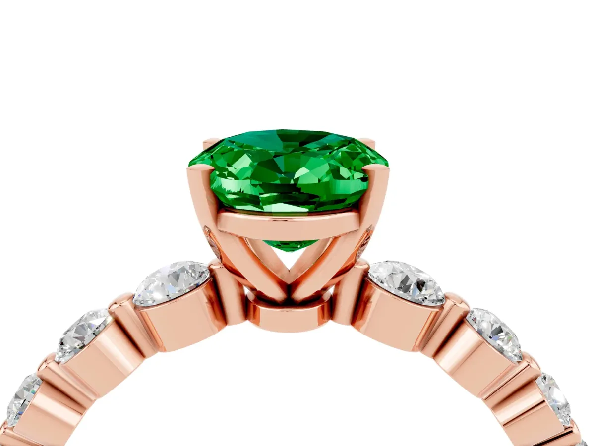 Oval Cut Solitaire Emerald Ring with Pave Band and Four-Prong Setting Rose gold