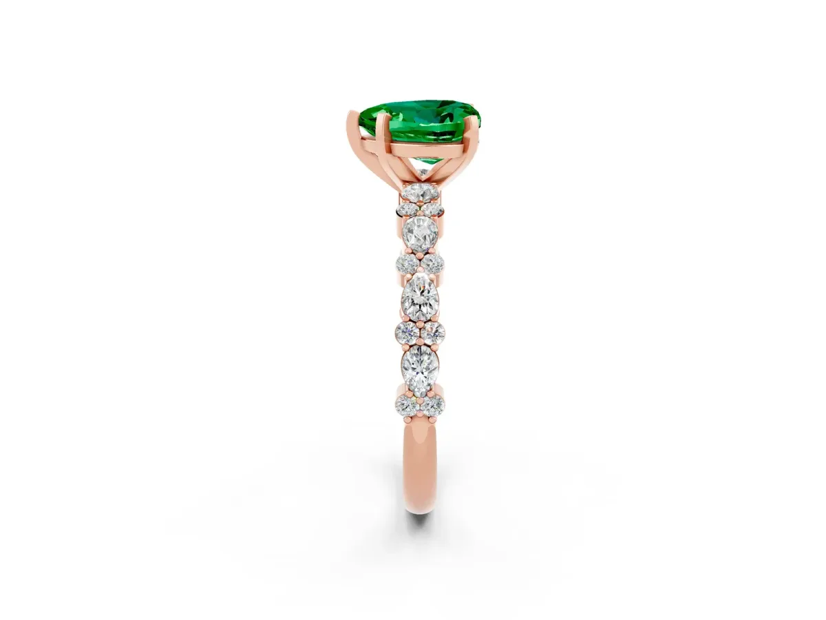 Heart Cut Emerald Side Stone Solitaire Ring with Round and Four-Prong Setting Rose gold