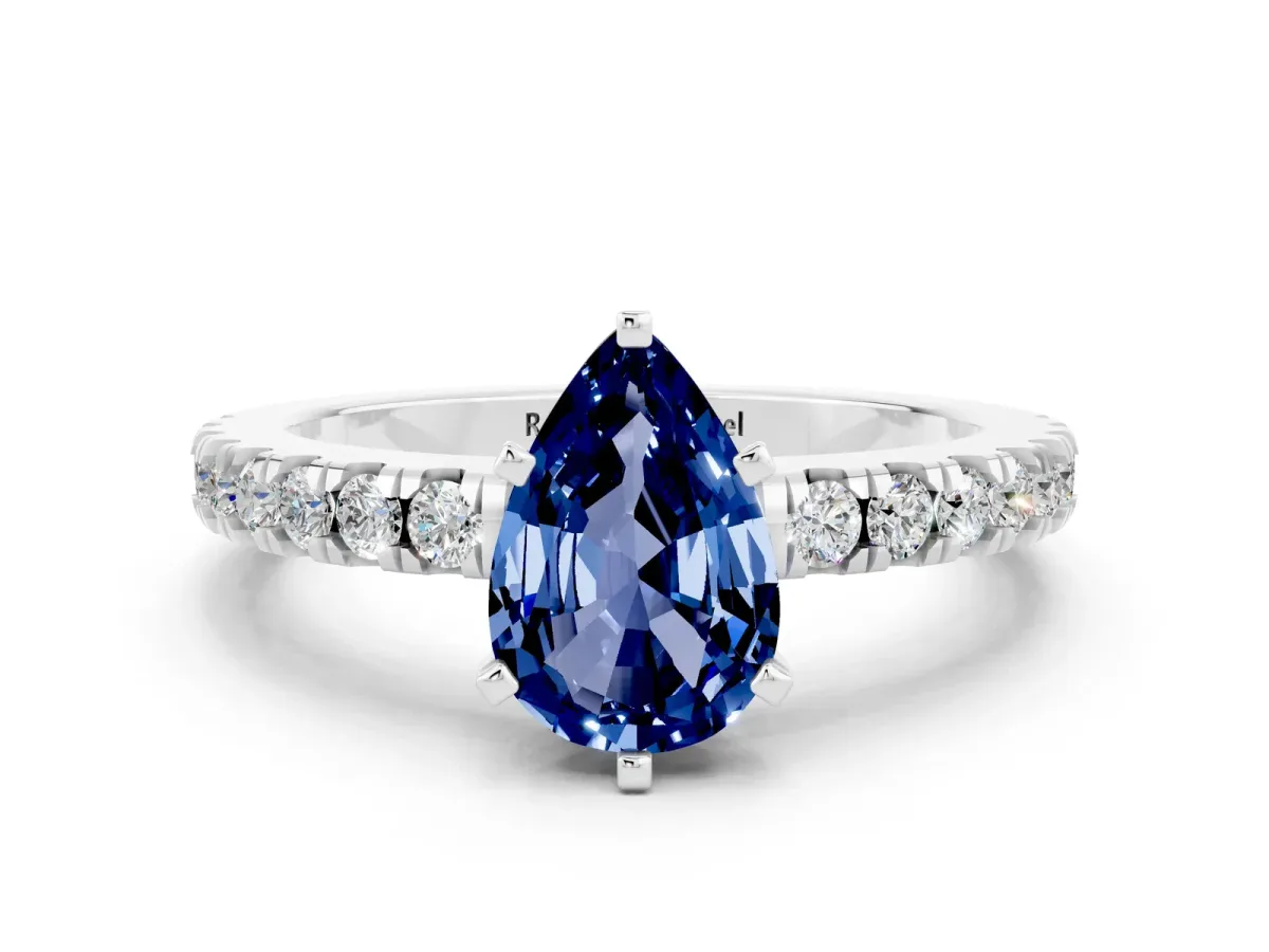 Pear Cut Solitaire Blue Sapphire with Pavé Band and Four-Prong Setting Silver