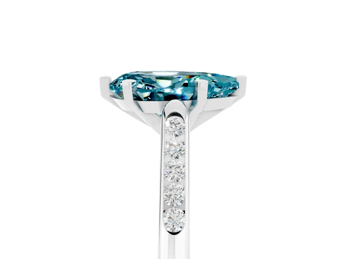 Pear Cut Blue Topaz Solitaire Ring with Channel Set Round Band and Prong Setting Silver