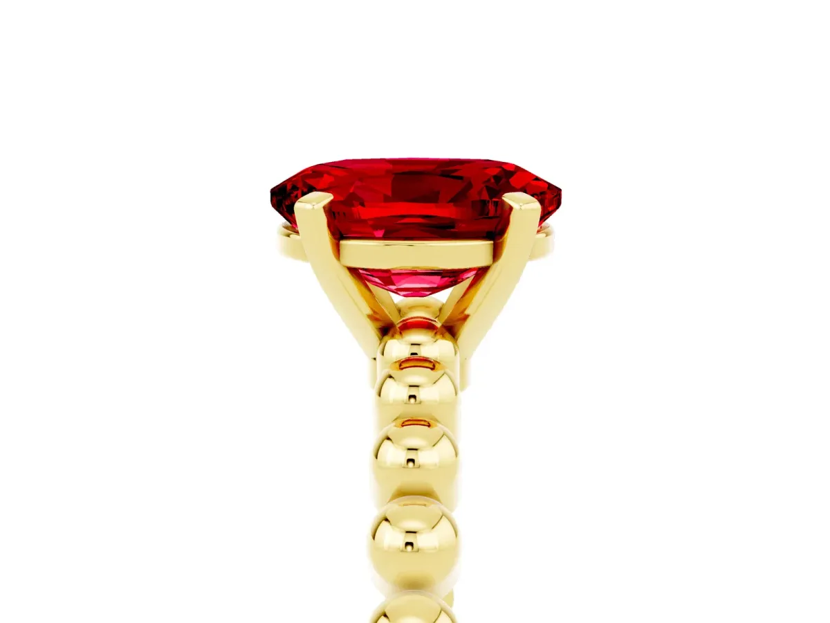 Oval Cut Ruby Solitaire Ring with Beaded Band and Prong Setting Yellow gold