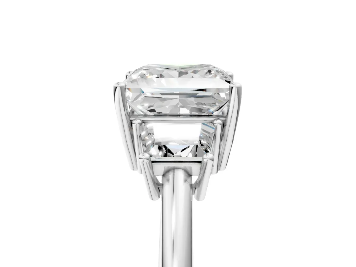 Princess Cut Diamond Three-Stone Ring with Trapezoid Side Stones and Prong Setting Platinum