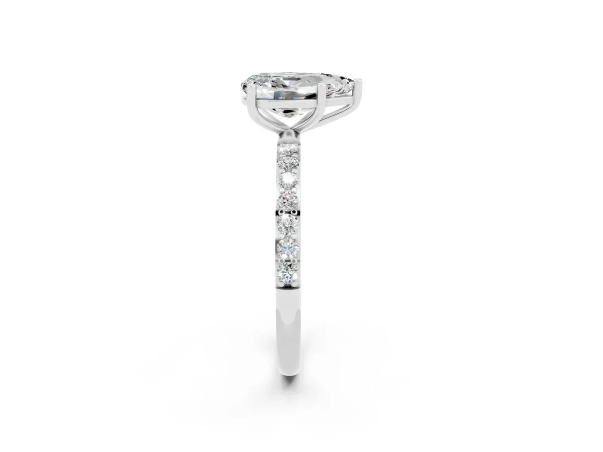 Pear Cut Moissanite Solitaire Ring with Round Pavé Band and Prong Setting Silver
