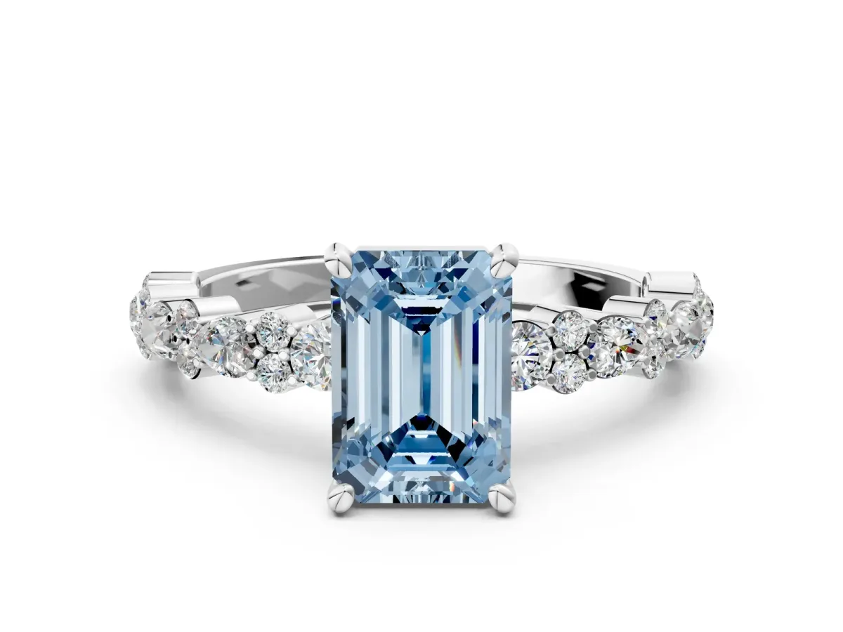 Fancy Blue Emerald Cut Diamond Side Stone Solitaire Ring with Round and Four-Prong Setting Platinum