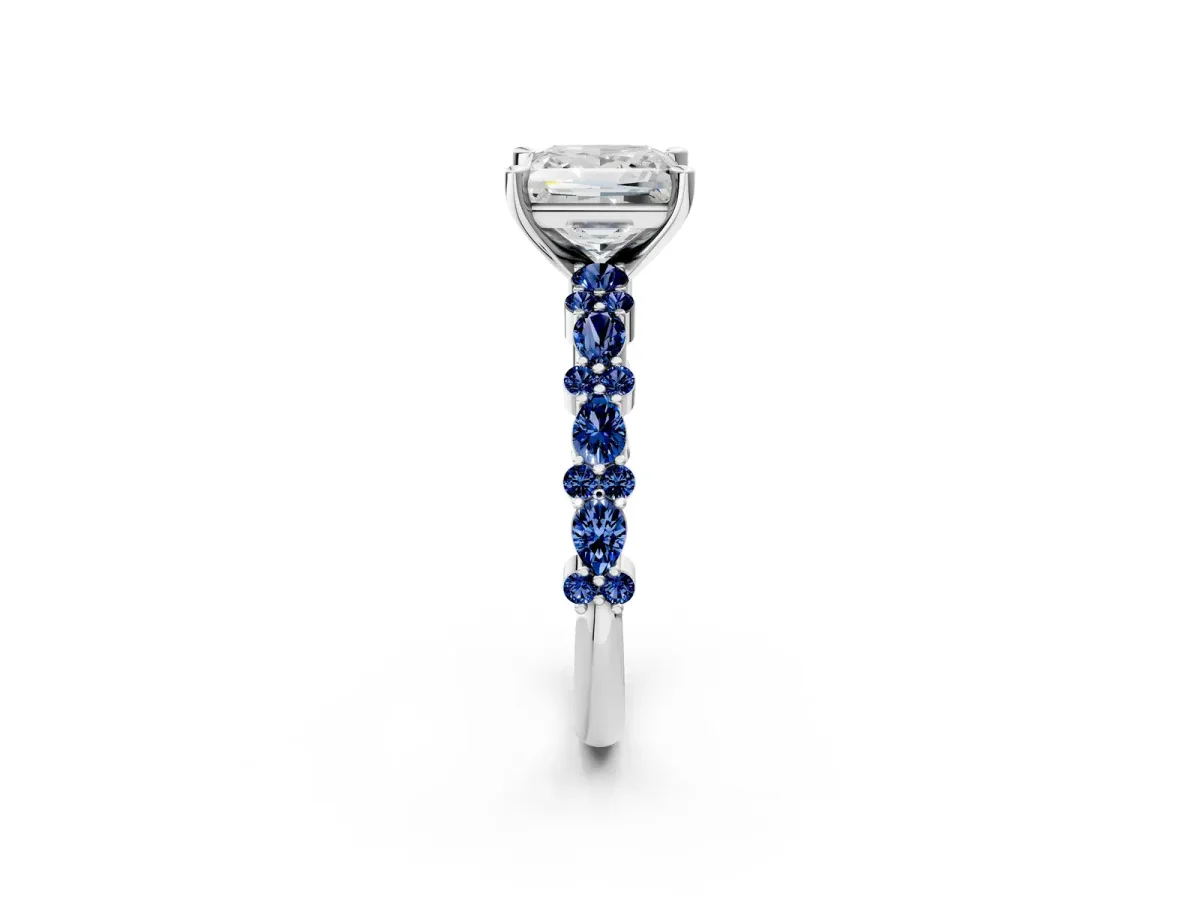 Princess Cut Diamond Side Stone Solitaire Ring with Round Blue Sapphire and Four-Prong Setting Silver