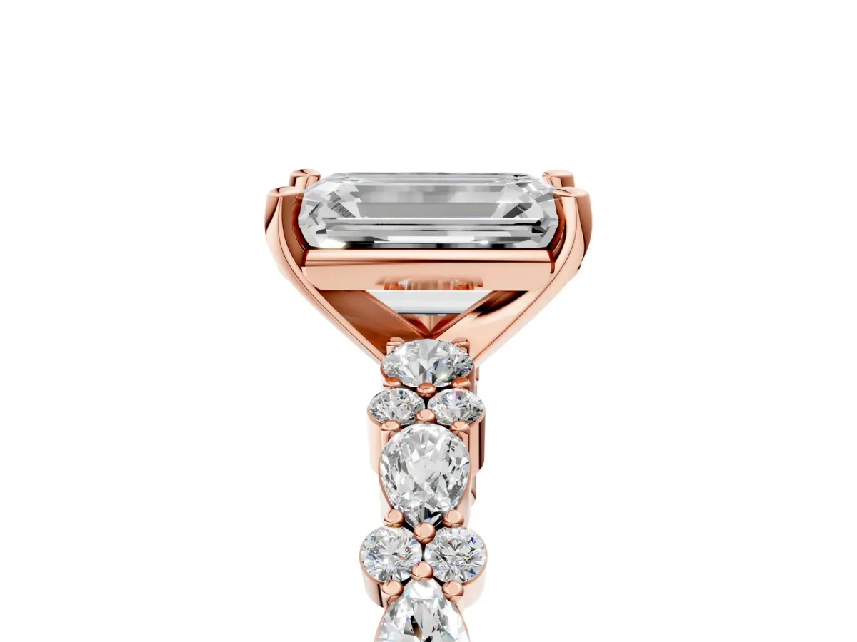 Emerald Cut Diamond Side Stone Solitaire Ring with Round and Four-Prong Setting Rose gold