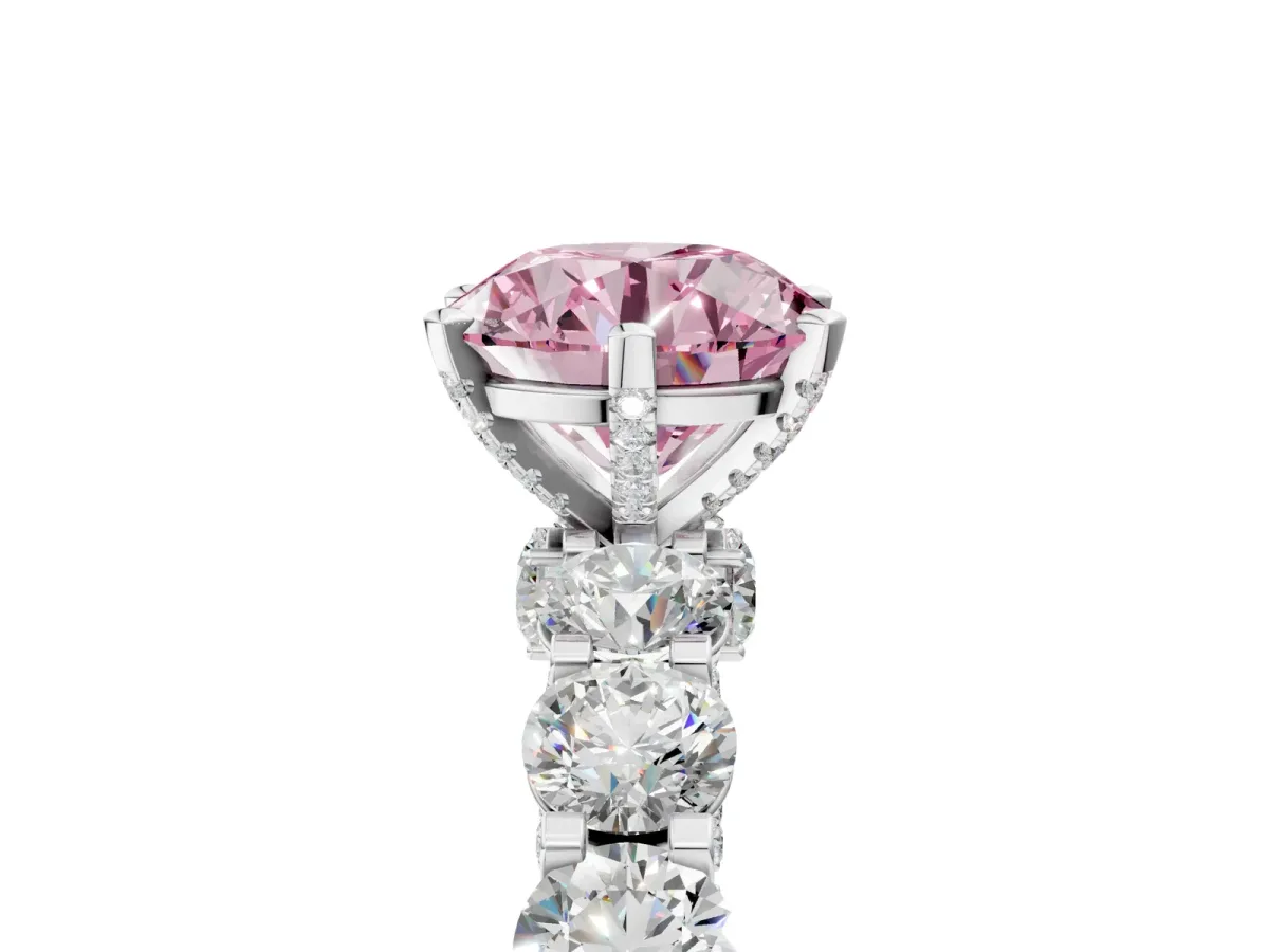 Fancy Pink Round Cut Diamond Side Stone Engagement Ring with Four-Prong Setting Silver